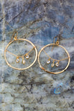 Circle charm hoop earrings