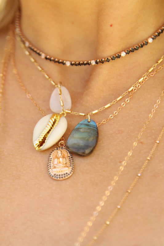 black and white tennis necklace and charms 