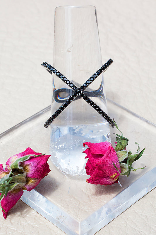 black criss cross ring