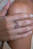 Rainbow eternity bands stacked